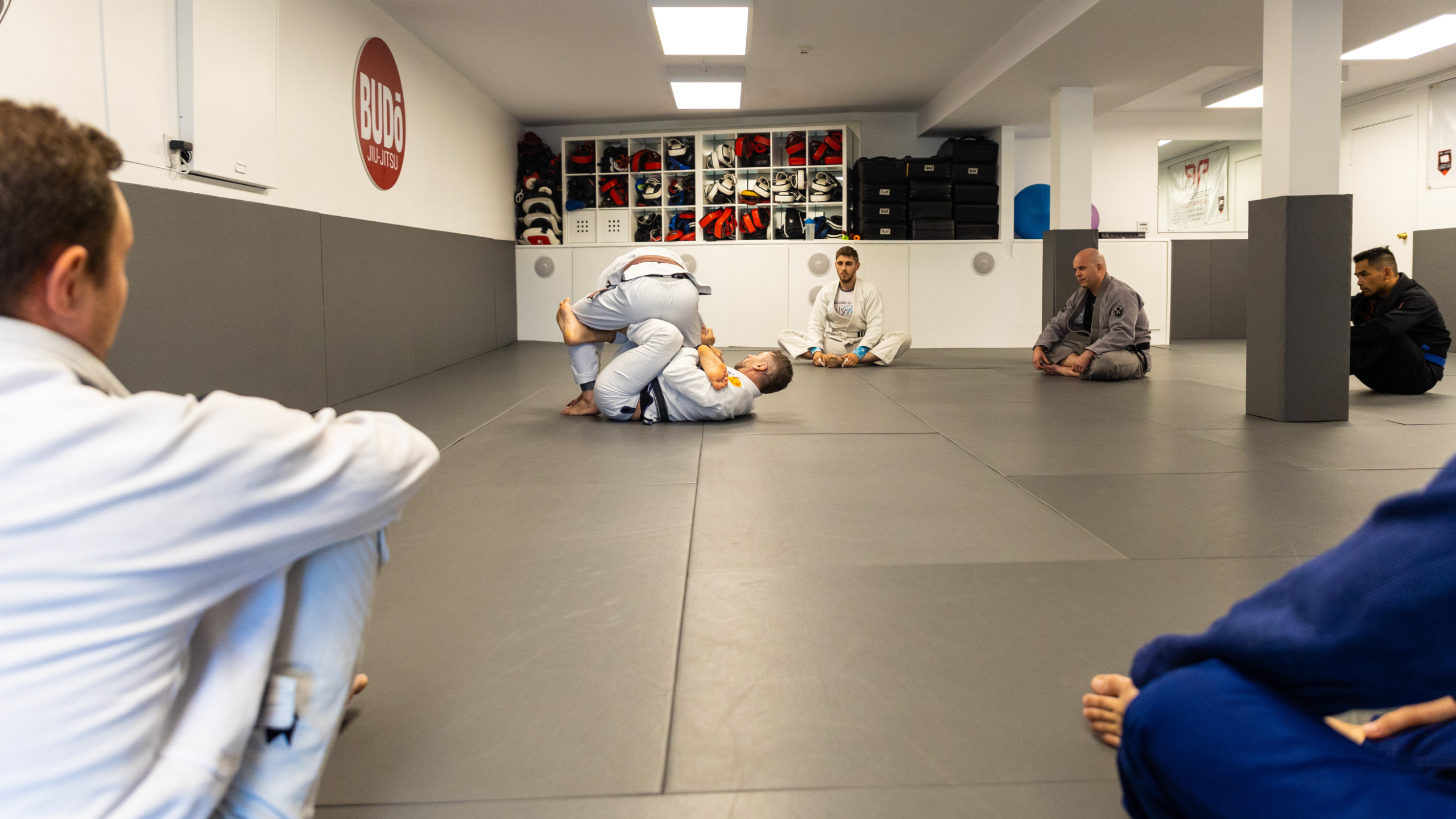Gi Jiu-Jitsu class instruction at Budo